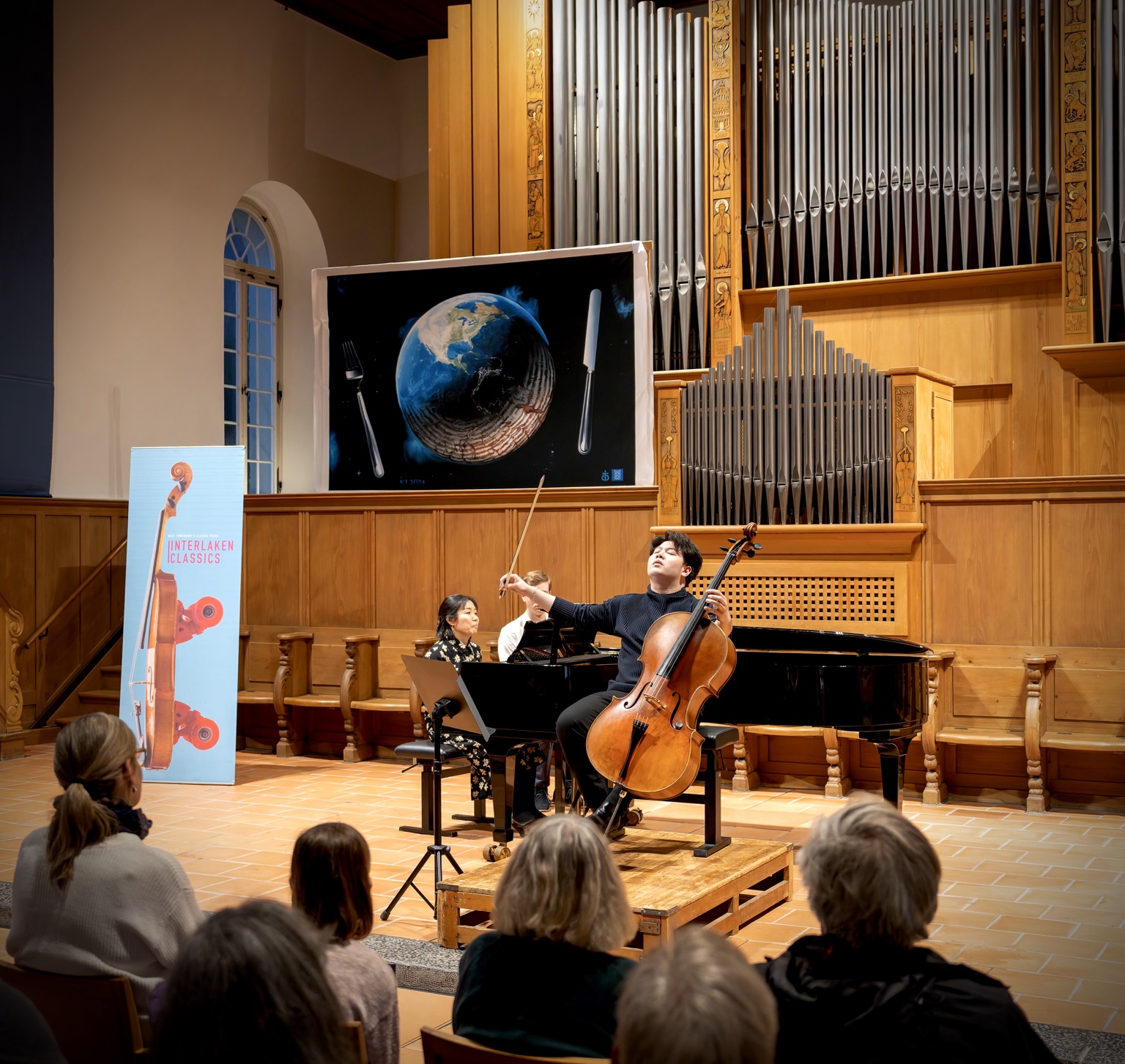 Yun Ho performing before an audience at the Interlaken Classics
